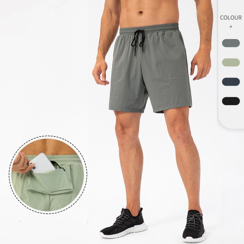 short de sport avec poche arrière zippée